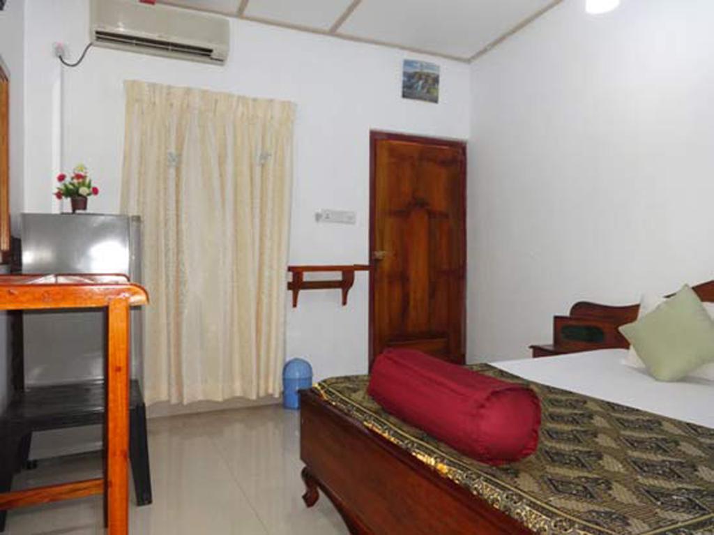 Dutch Bay Beach Cottages ตรินโคมาลี ห้อง รูปภาพ